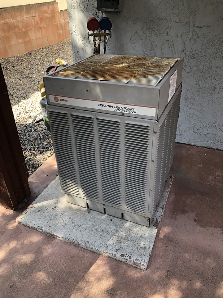 HVAC maintenance on old air conditioner